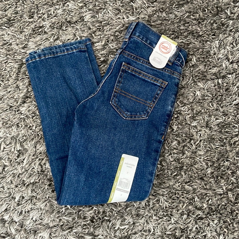 New with tags! Relaxed, slim, size 7 boys jeans.